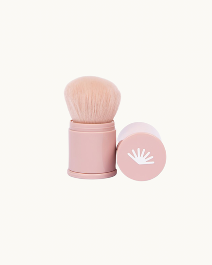 Sunscreen applicator brush